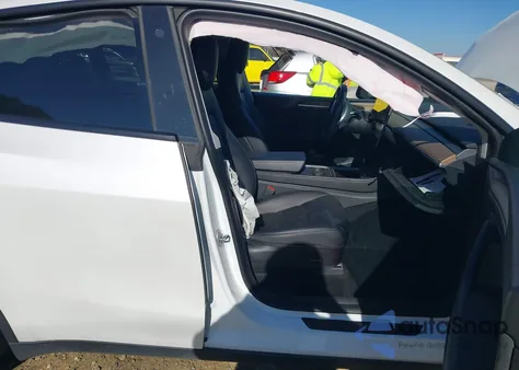 2023 Tesla Model Y Awd/Long Range Dual Motor All-Wheel Drive z USA, uszkodzony, nr VIN 7SAYGDEE7PF660352